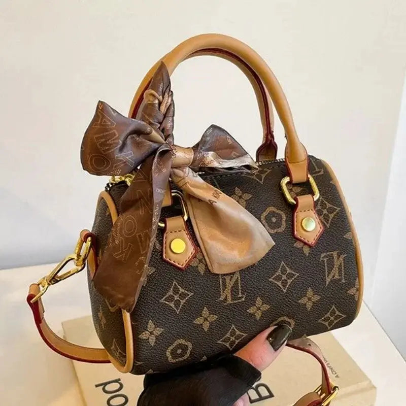 Luxury Messenger Purse Bag - Women's Crossbody Tote With Retro Solid Color & Premium Leather Finish featuring a stylish bow.